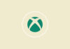 Xbox logo mark with warning signs.